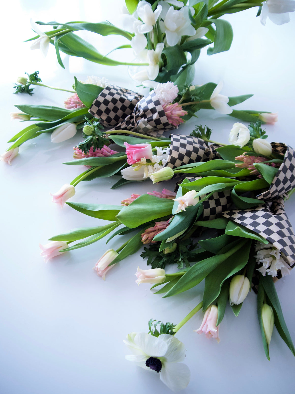 WRAPPED FLOWERS. NO VASE.