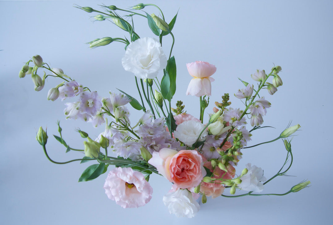 FLOWERS DESIGNED IN A VASE.