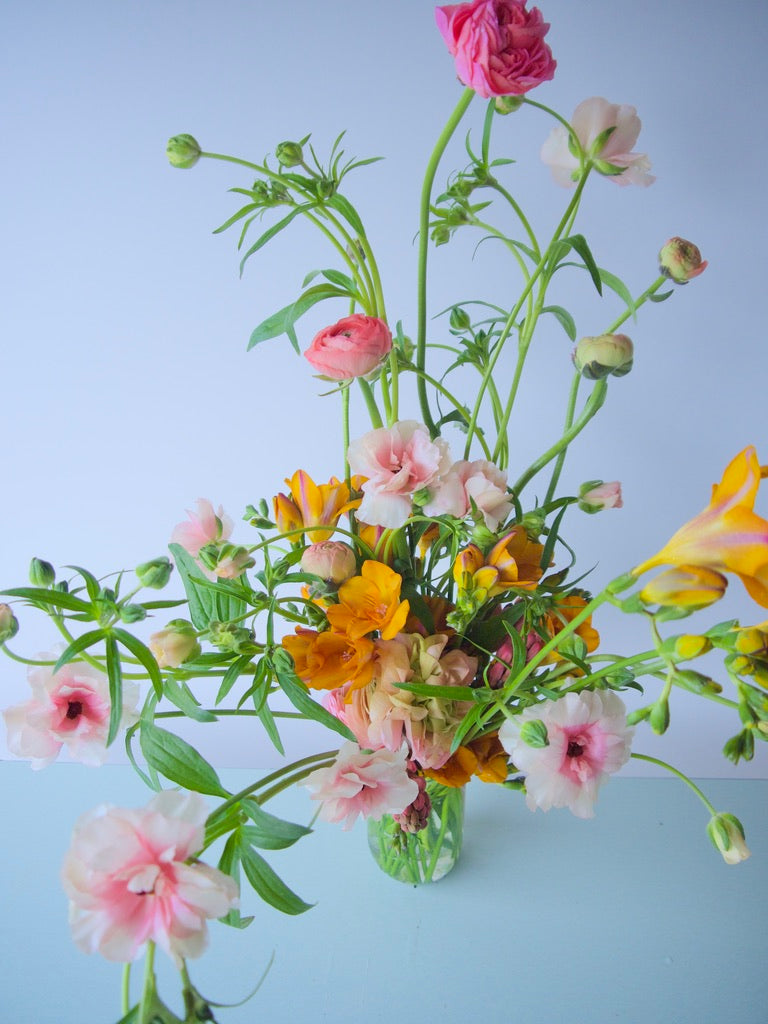 FLOWERS DESIGNED IN A VASE.