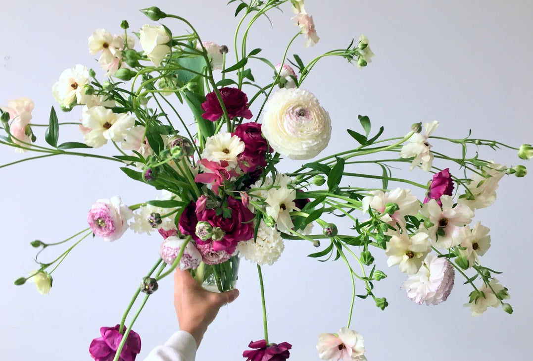 LARGE FLOWERS IN A VASE.