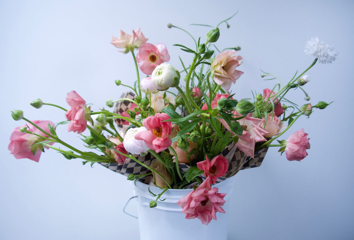WRAPPED FLOWERS. NO VASE.