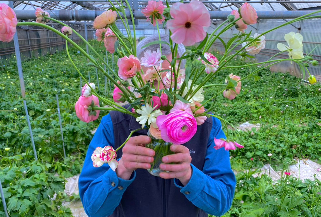 FLOWERS DESIGNED IN A VASE.