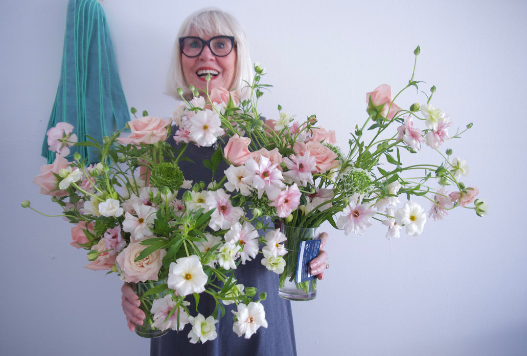 FLOWERS DESIGNED IN A VASE.