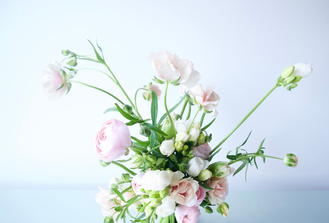 FLOWERS DESIGNED IN A VASE.