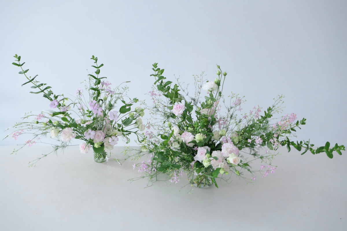 FLOWERS DESIGNED IN A VASE.