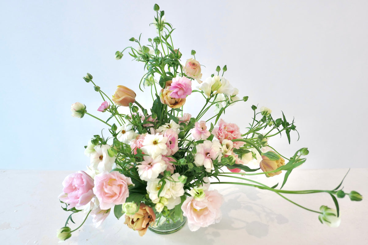 FLOWERS DESIGNED IN A VASE.