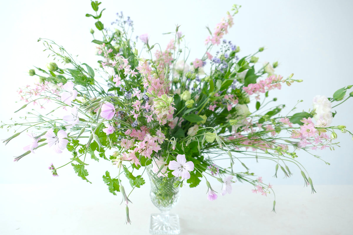 FLOWERS DESIGNED IN A VASE.