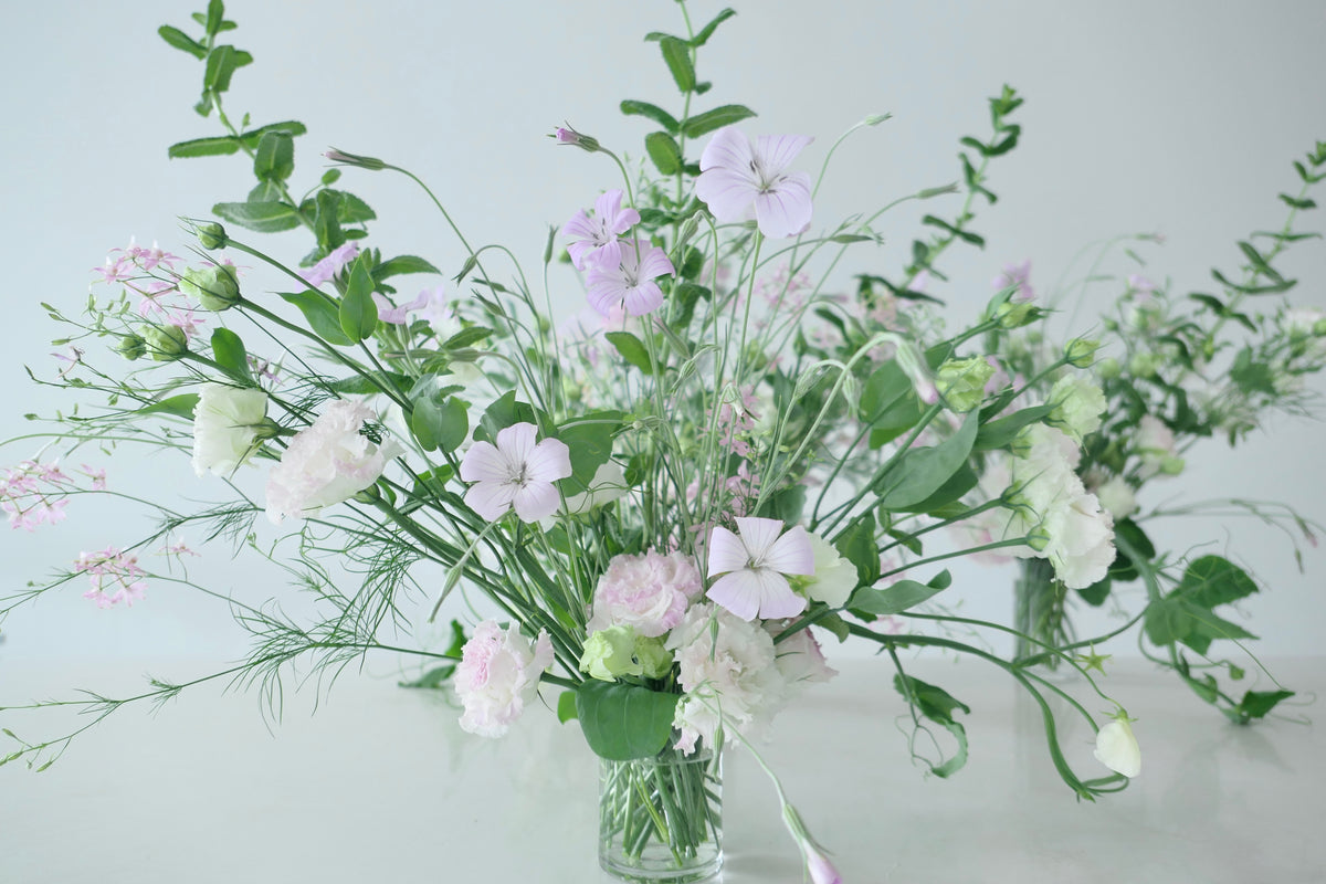 FLOWERS DESIGNED IN A VASE.