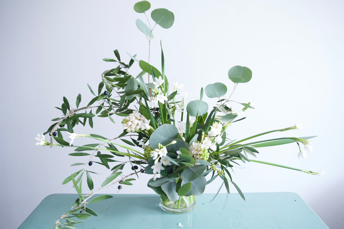 FLOWERS DESIGNED IN A VASE.