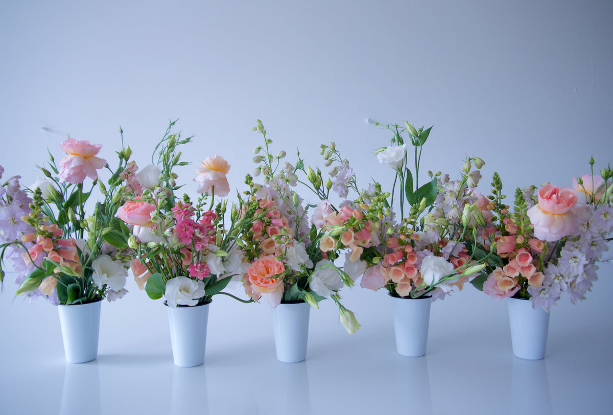 FLOWERS DESIGNED IN A VASE.