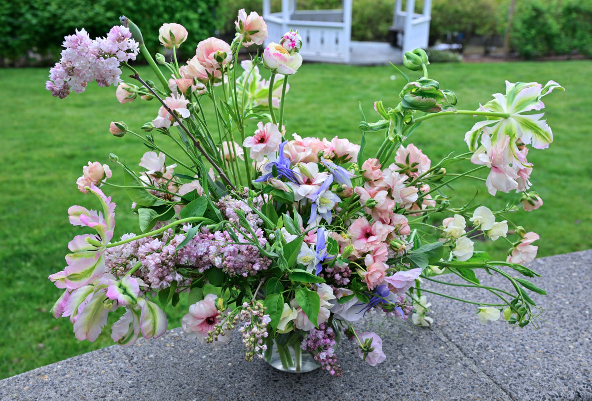 FLOWERS DESIGNED IN A VASE.