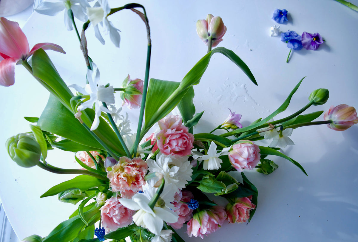 FLOWERS DESIGNED IN A VASE.