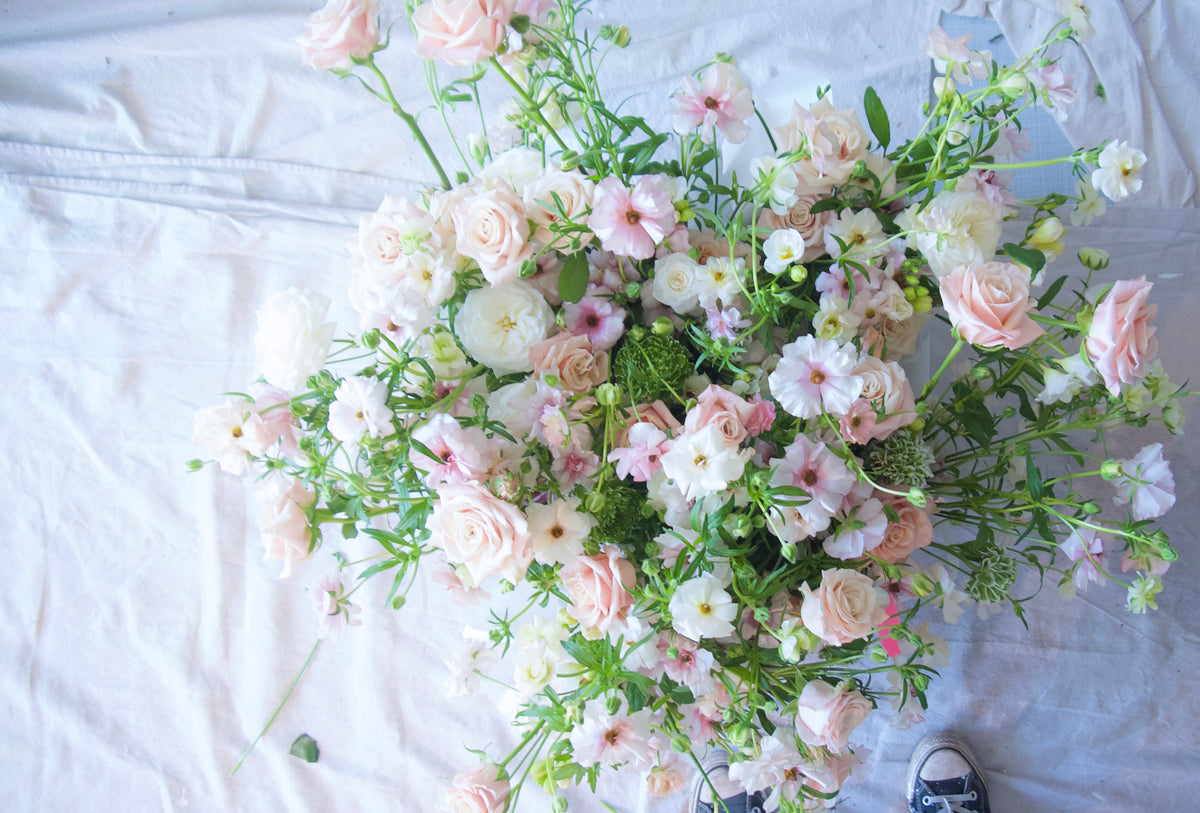 WRAPPED FLOWERS. NO VASE.