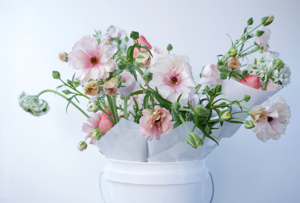 WRAPPED FLOWERS. NO VASE.