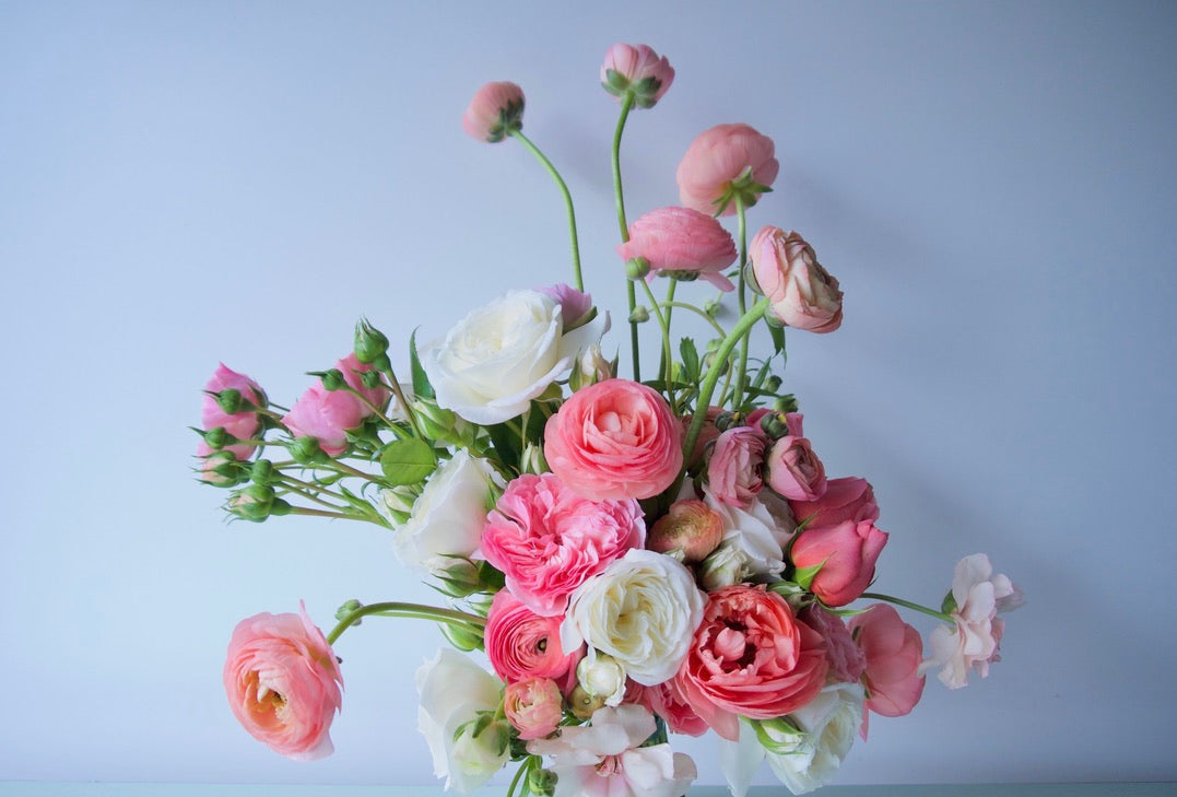 FLOWERS DESIGNED IN A VASE.