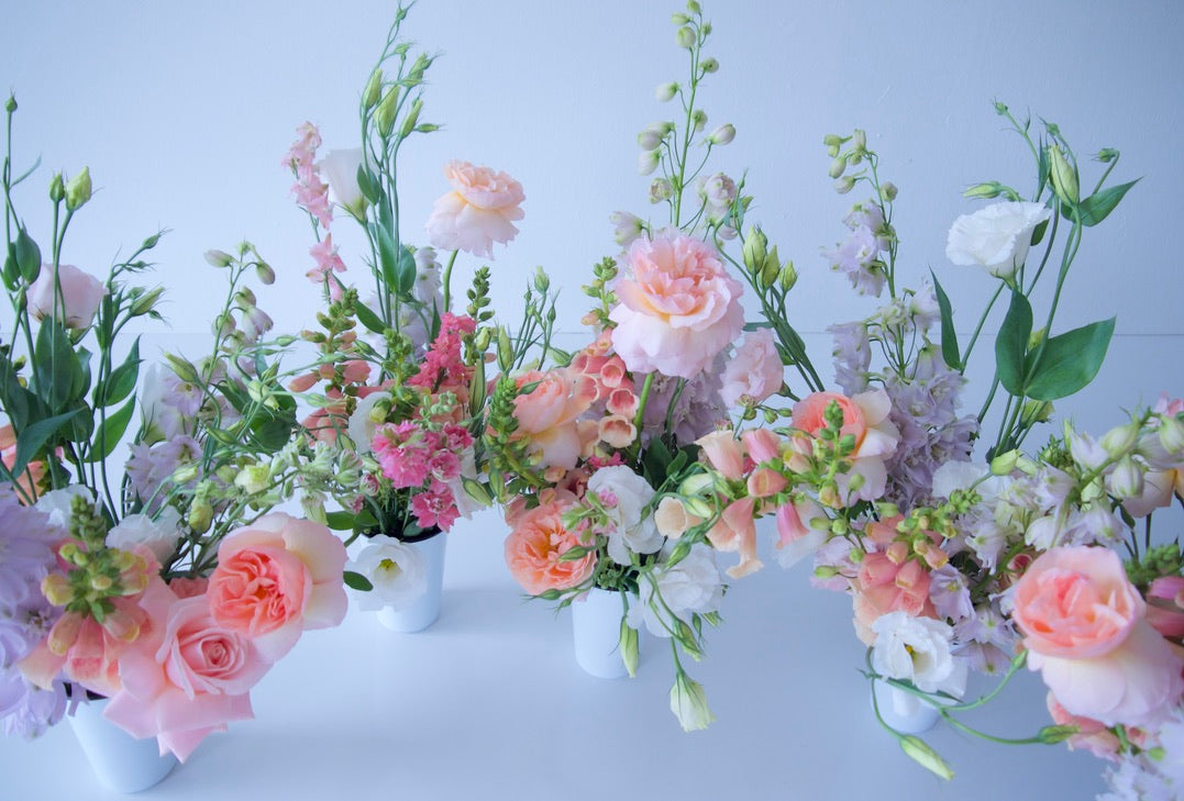 FLOWERS DESIGNED IN A VASE.