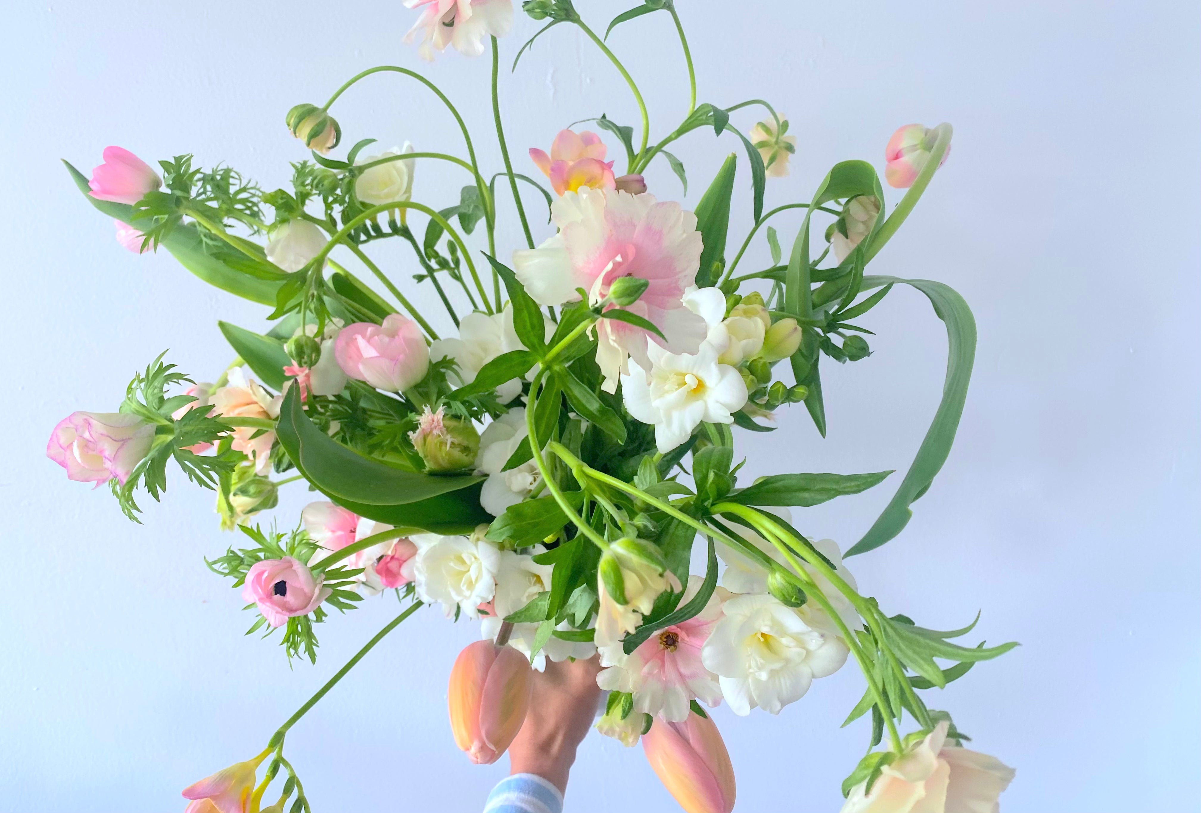 FLOWERS DESIGNED IN A VASE.
