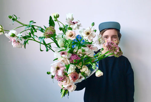 LARGE WRAPPED FLOWERS. NO VASE.