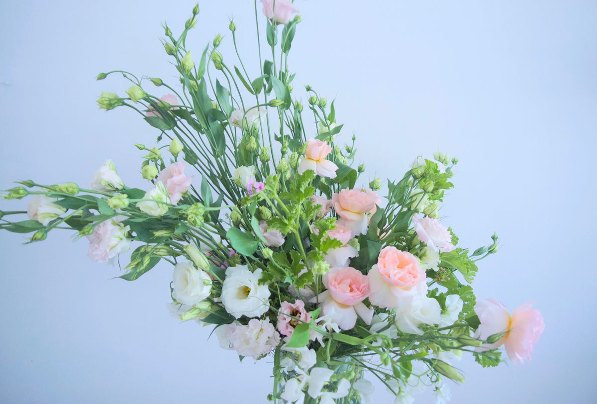 FLOWERS DESIGNED IN A VASE.