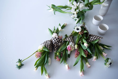 MEDIUM WRAPPED FLOWERS. NO VASE.