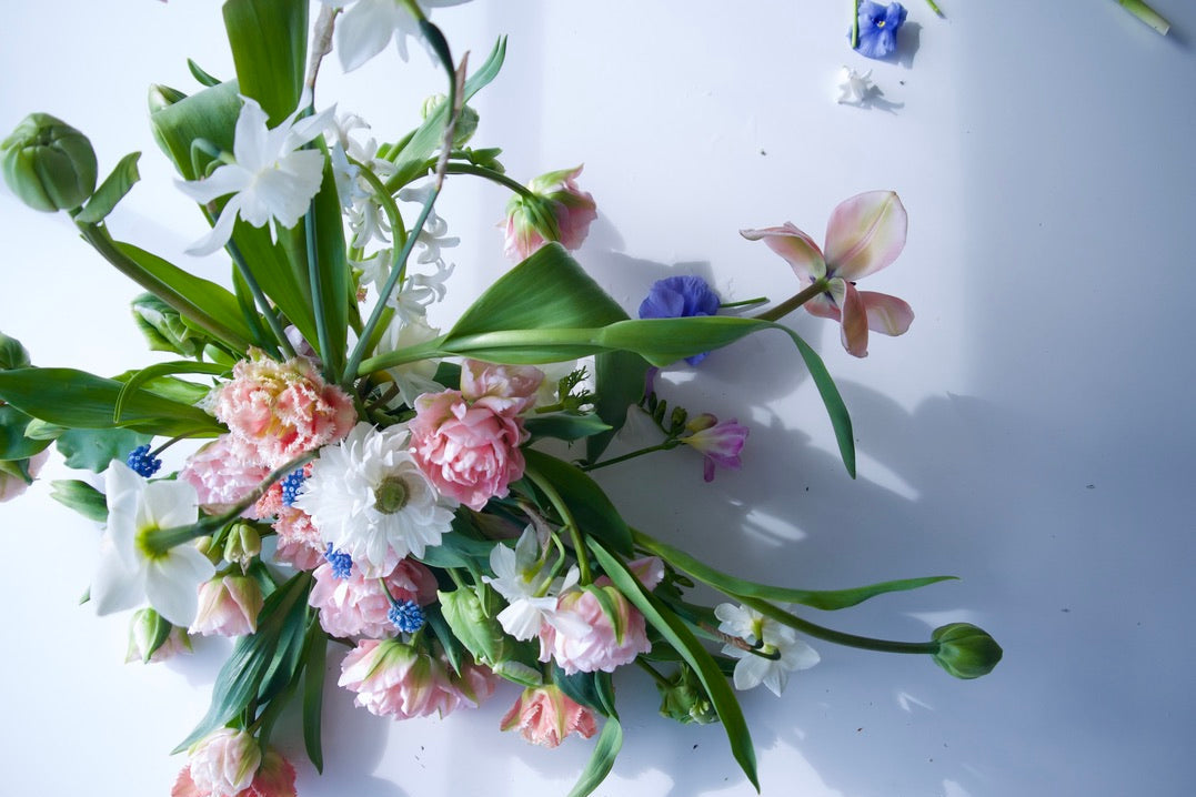 FLOWERS DESIGNED IN A VASE.