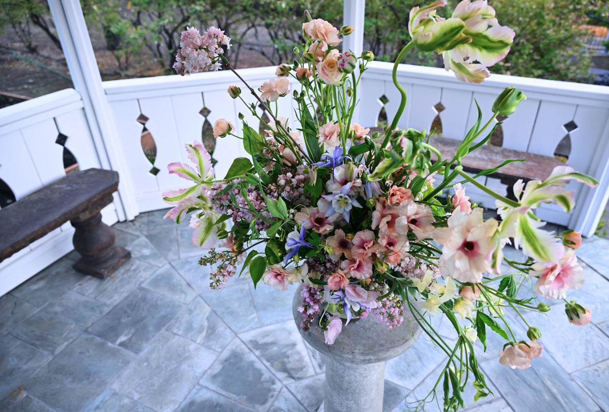 FLOWERS DESIGNED IN A VASE.