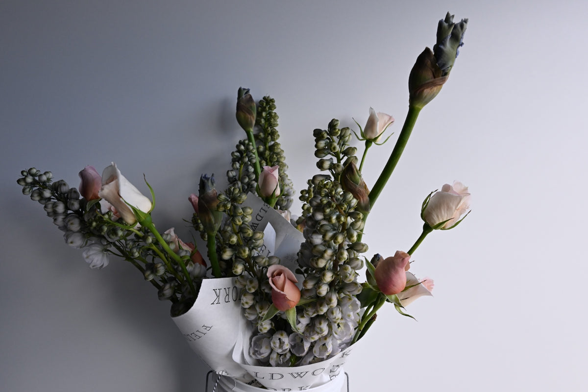 WRAPPED FLOWERS. NO VASE.