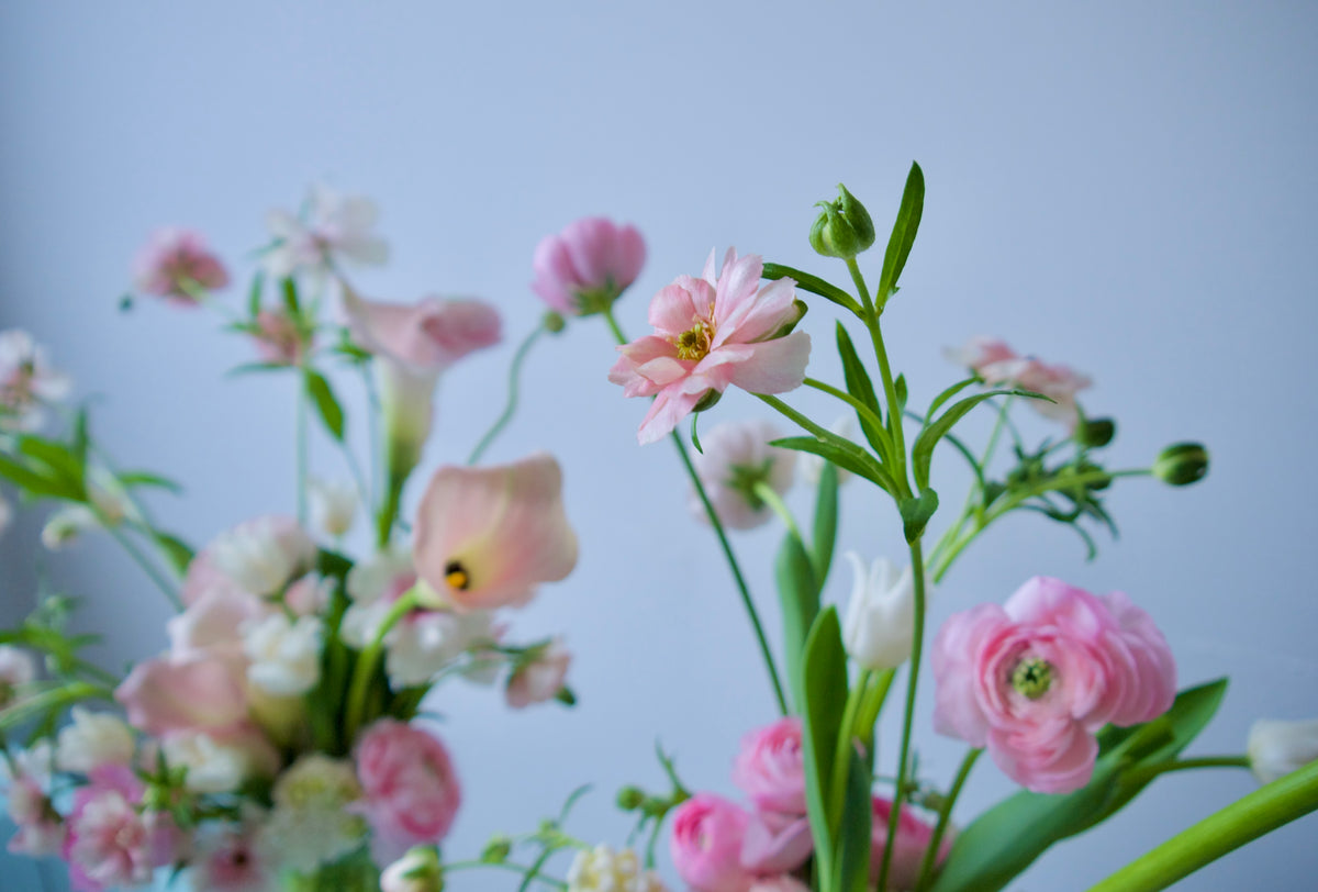 FLOWERS DESIGNED IN A VASE.