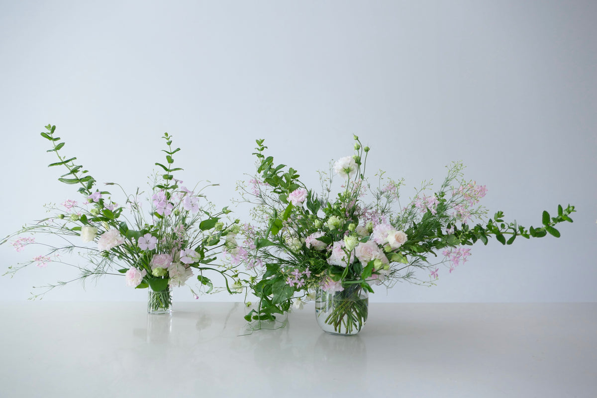 FLOWERS DESIGNED IN A VASE.