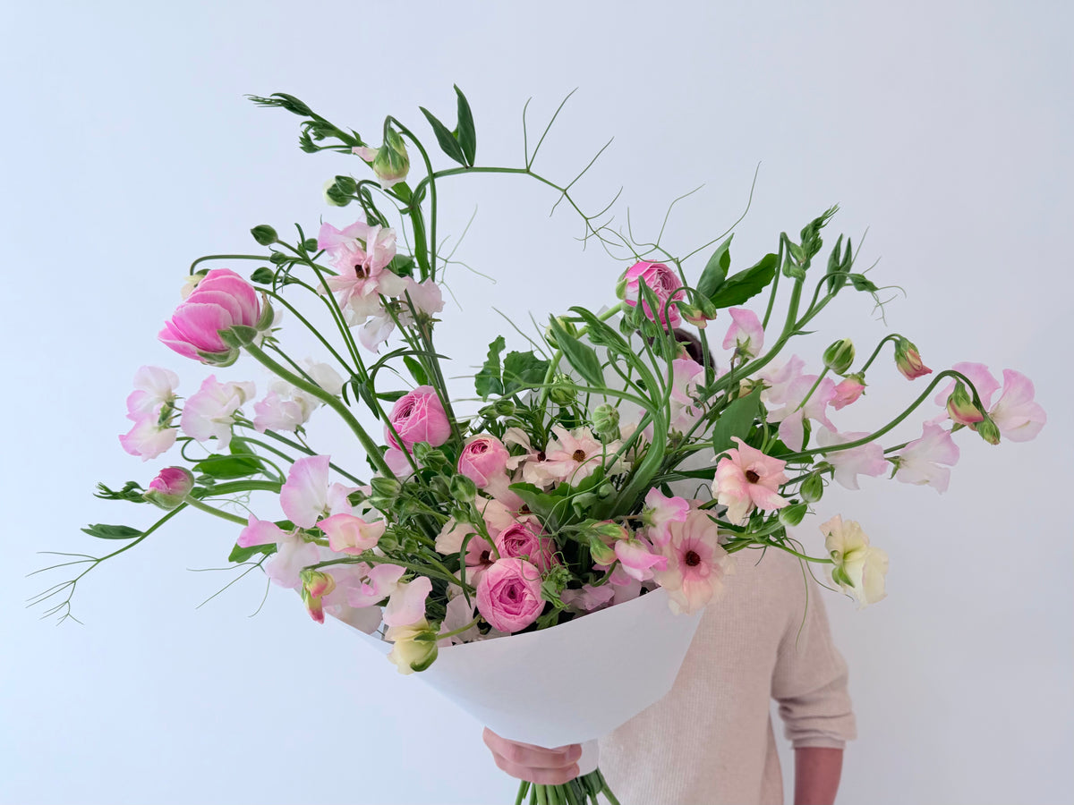 WRAPPED FLOWERS. NO VASE.