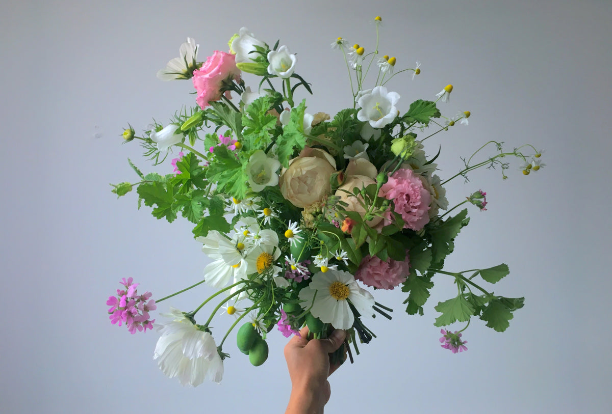 WRAPPED FLOWERS. NO VASE.