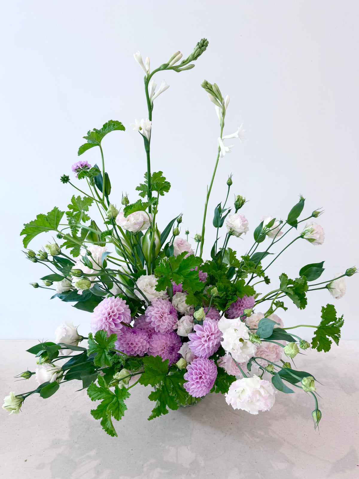 FLOWERS DESIGNED IN A VASE.
