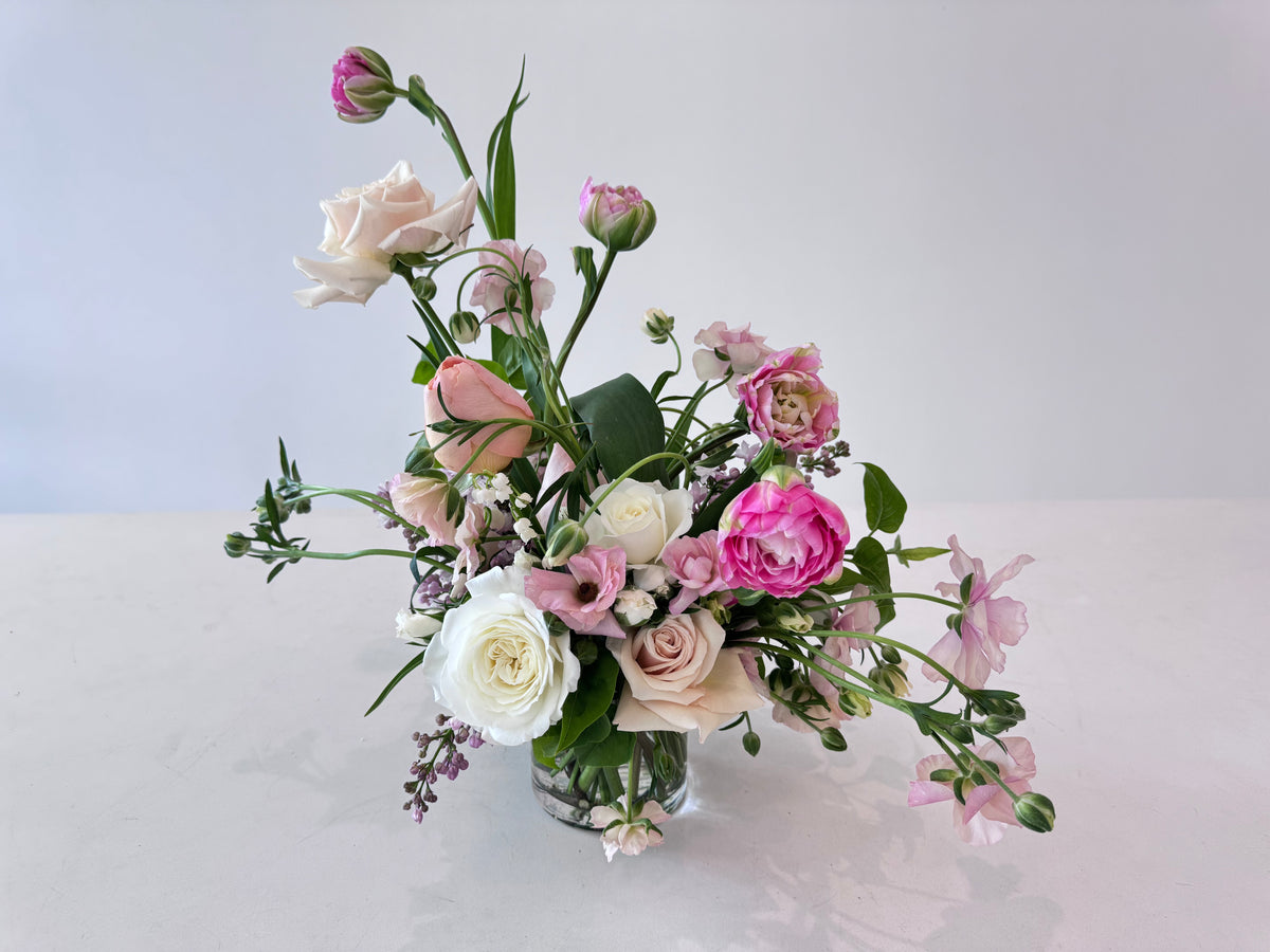 FLOWERS DESIGNED IN A VASE.