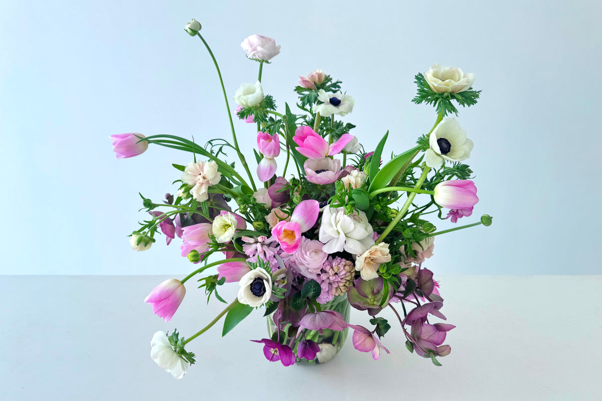 FLOWERS DESIGNED IN A VASE.