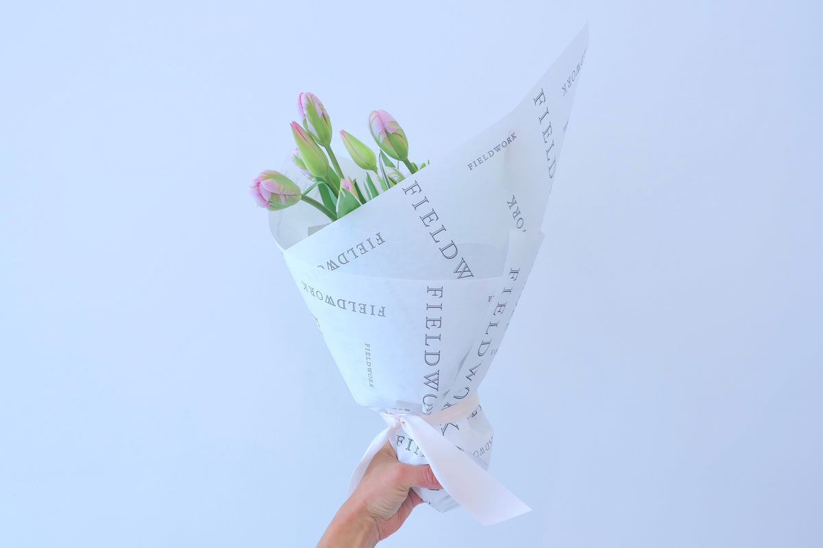 WRAPPED FLOWERS. NO VASE.