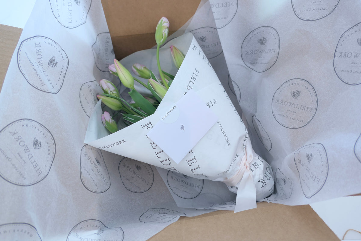 WRAPPED FLOWERS. NO VASE.