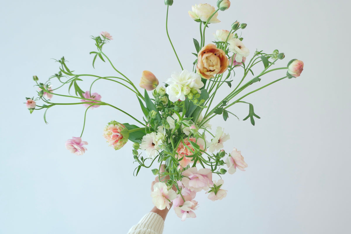FLOWERS DESIGNED IN A VASE.