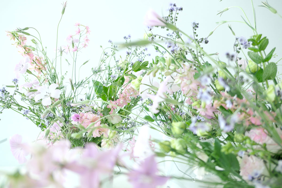 FLOWERS DESIGNED IN A VASE.