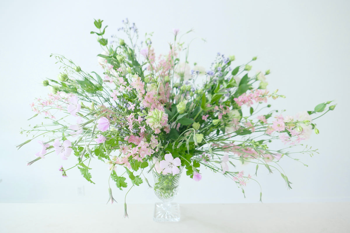 FLOWERS DESIGNED IN A VASE.