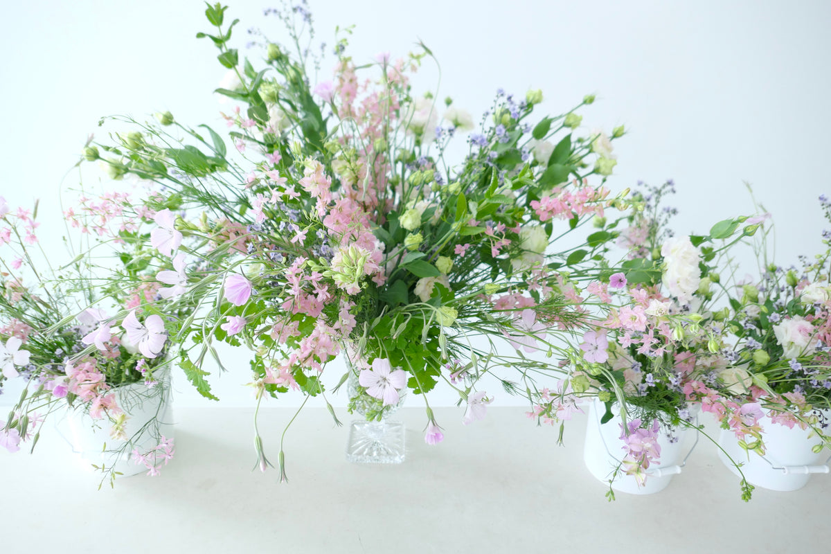 FLOWERS DESIGNED IN A VASE.