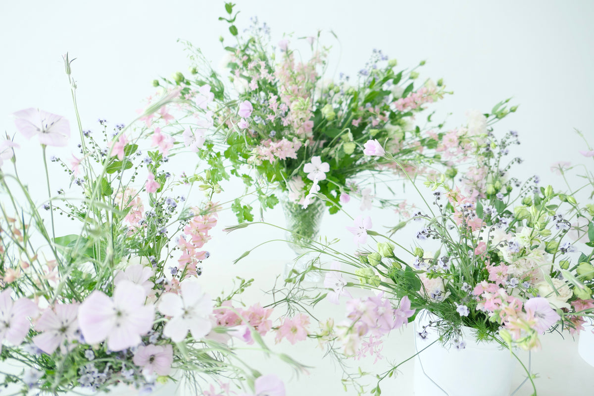 FLOWERS DESIGNED IN A VASE.