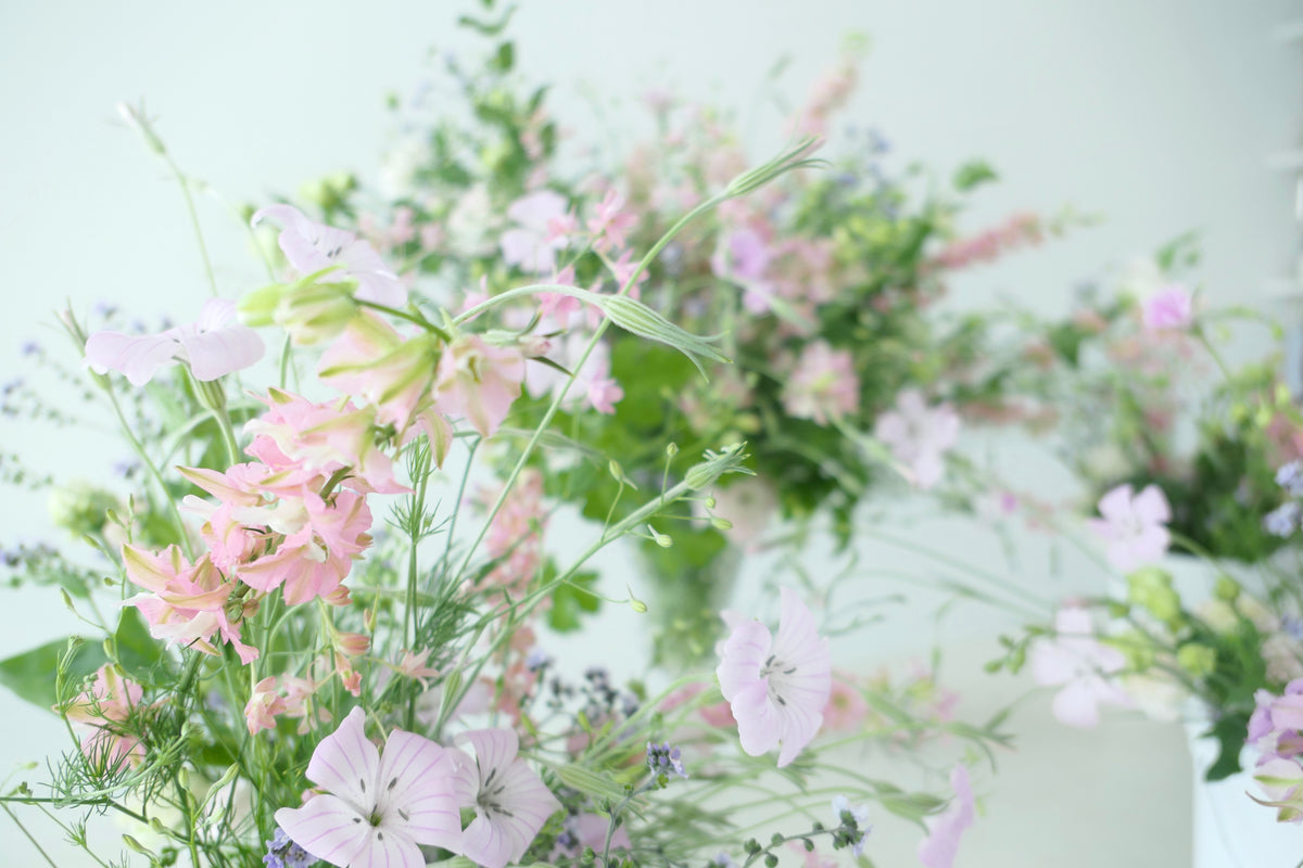 FLOWERS DESIGNED IN A VASE.