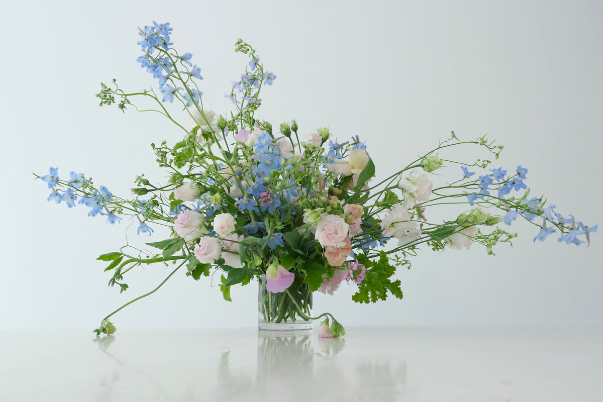 FLOWERS DESIGNED IN A VASE.