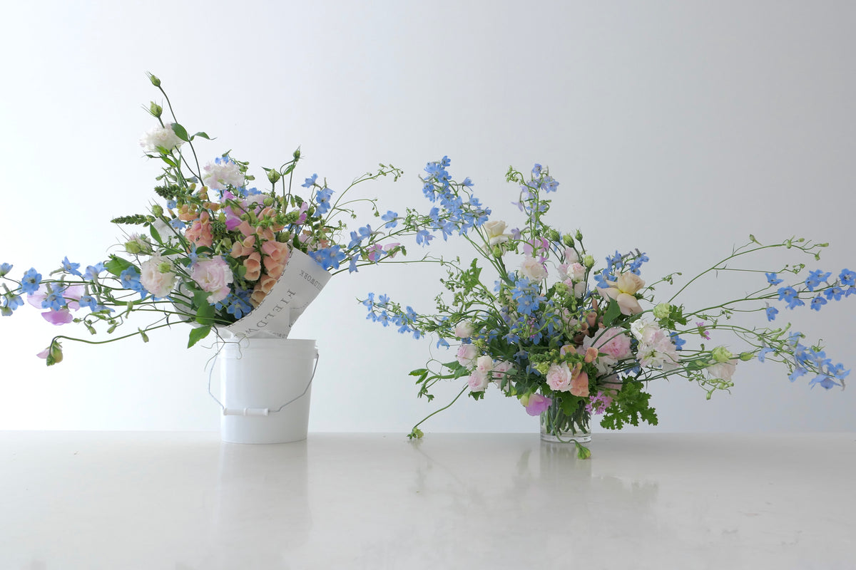 FLOWERS DESIGNED IN A VASE.