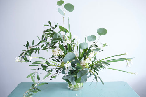 SM TO XL FLOWERS IN A VASE.