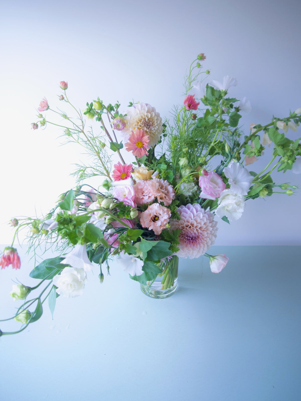 FLOWERS DESIGNED IN A VASE.