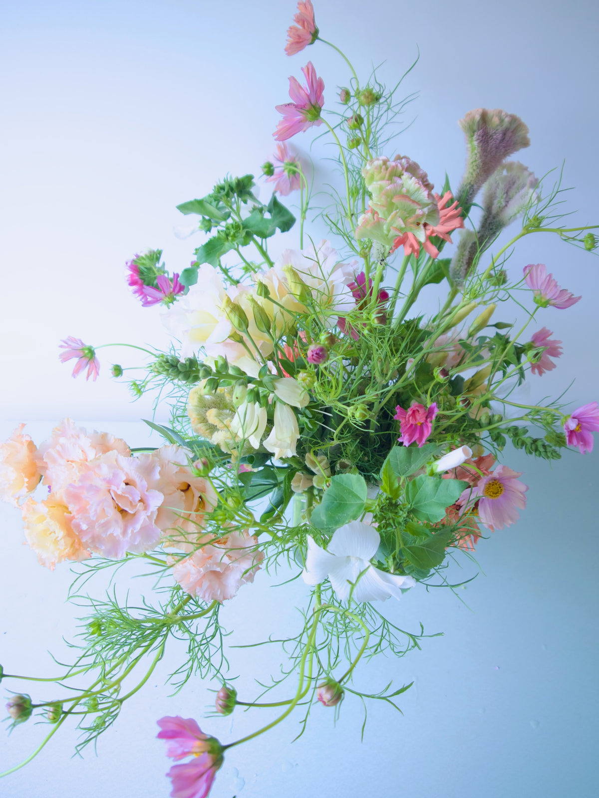 FLOWERS DESIGNED IN A VASE.