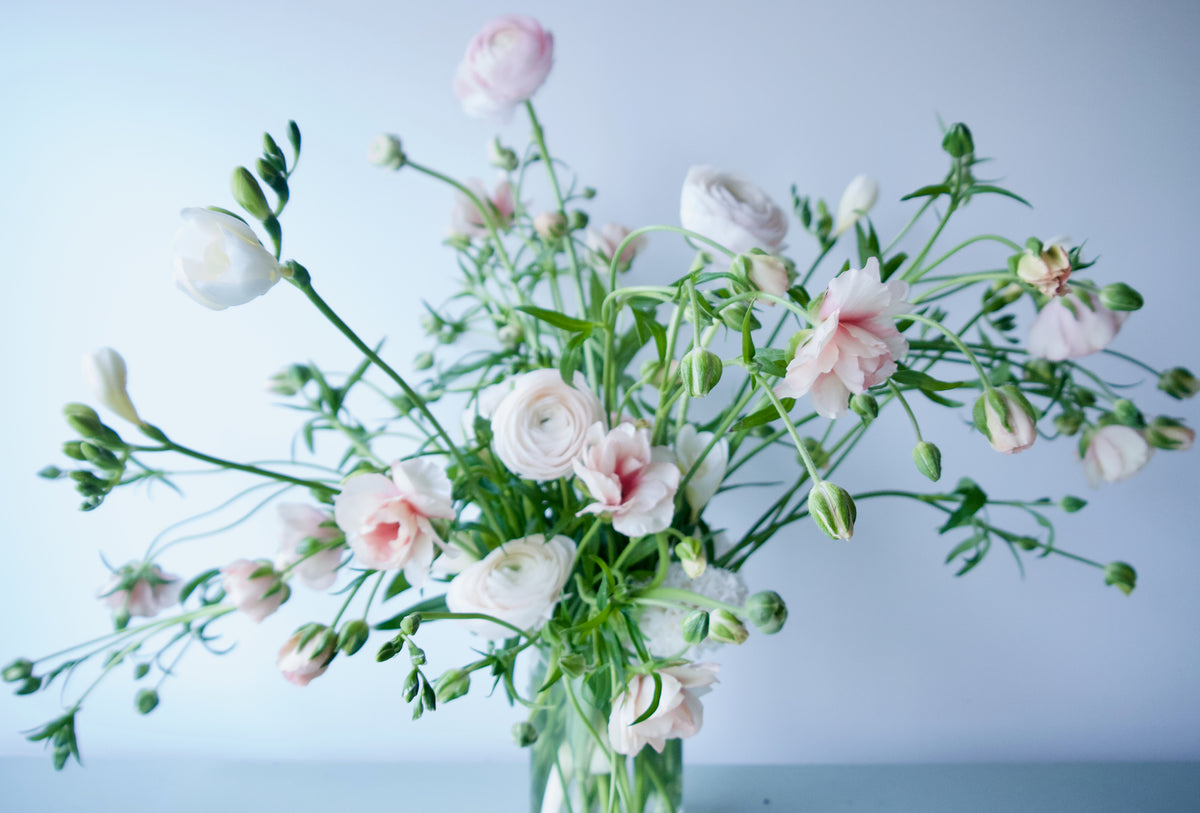 FLOWERS DESIGNED IN A VASE.